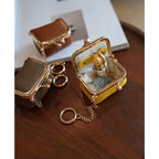 CUCUBIRD Top Grain Leather Kiss Lock Mini Bag  