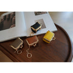 CUCUBIRD Top Grain Leather Kiss Lock Mini Bag  